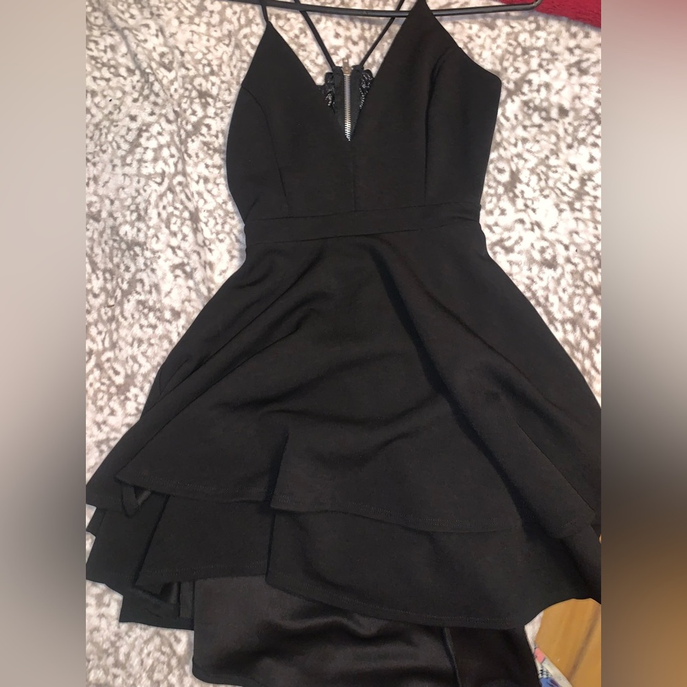 Women black dress. Cute back moment!! Three wavy layers not really puffy